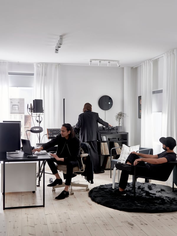 A black OBEGRÄNSAD desk