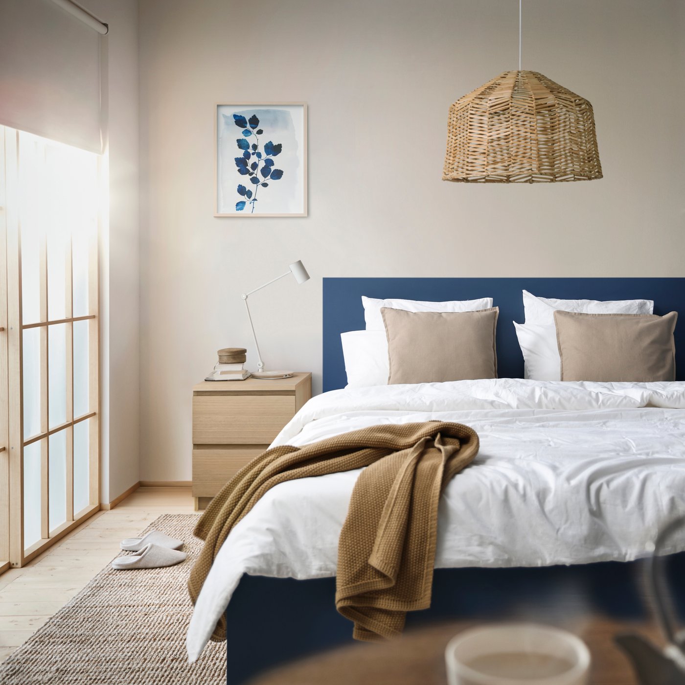 A blue MALM bed frame, high, w 2 storage boxes