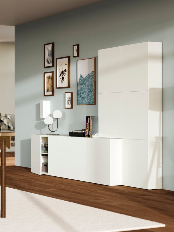 A white Lappviken/white BESTÅ storage combination with doors in the living room