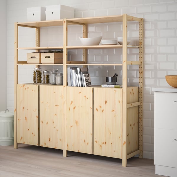 A wooden IVAR cabinet in the storage