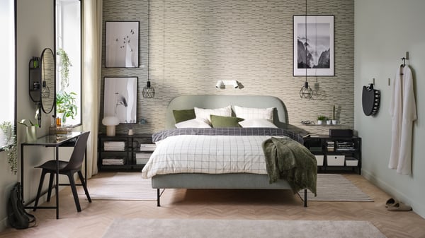 A Gunnared light green VADHEIM upholstered bed frame