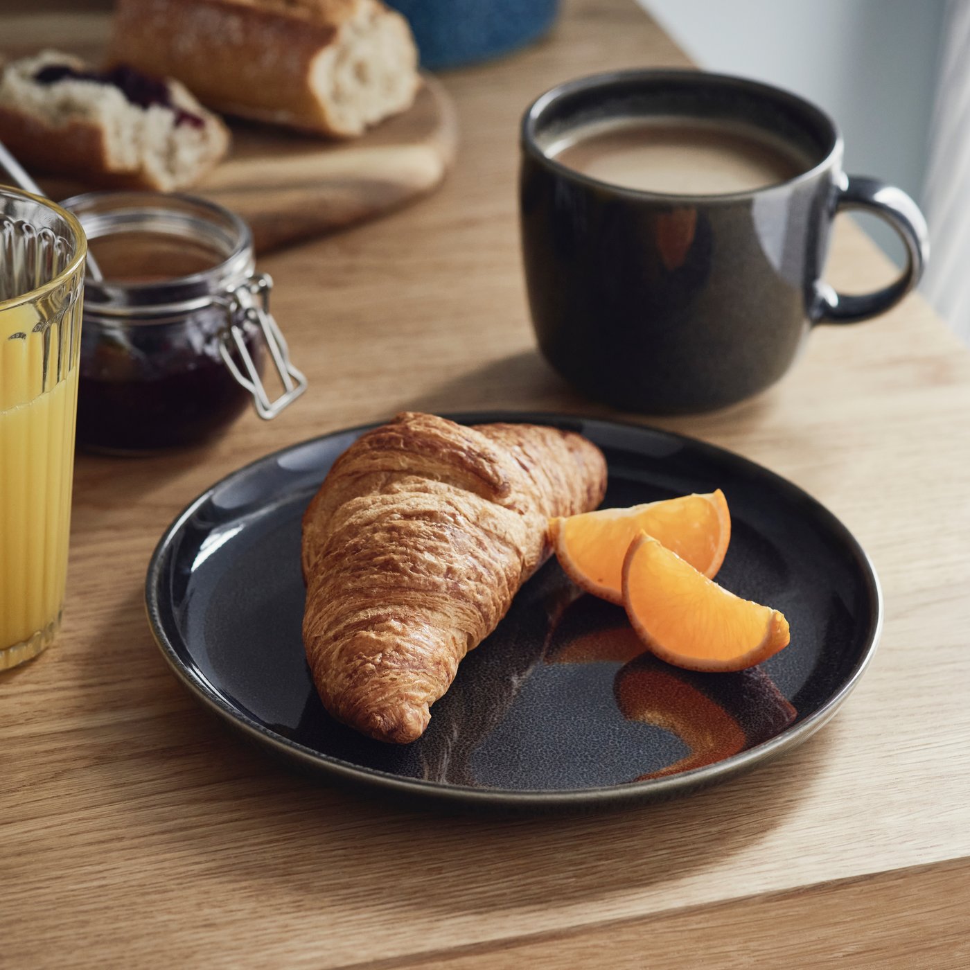 A dark grey GLADELIG bowl