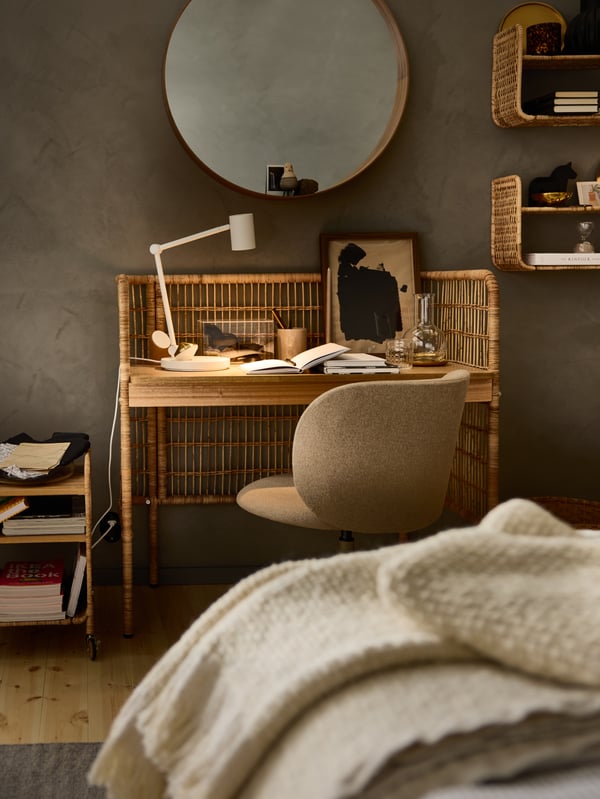 An oak veneer STOCKHOLM mirror.