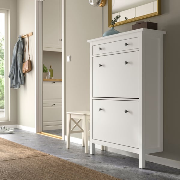 A white HEMNES shoe cabinet with 2 compartments
