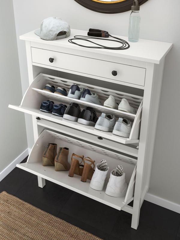 A white HEMNES shoe cabinet with 2 compartments
