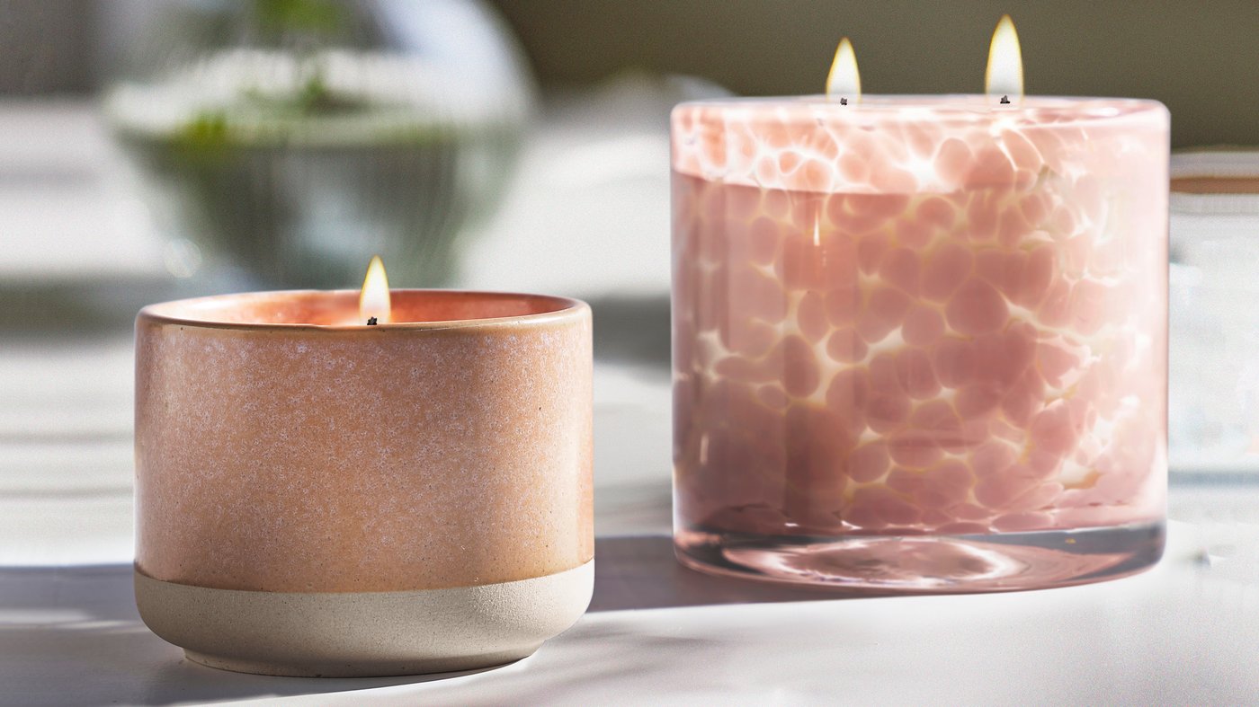 A Jasmine/pink LUGNARE scented candle in ceramic jar