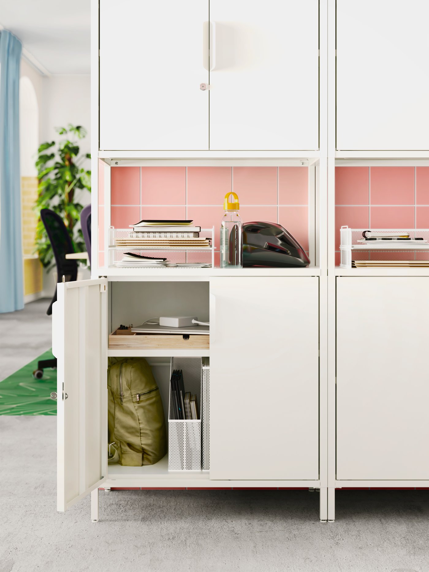 A white TROTTEN cabinet with shelves in a meeting room/office in Singapore