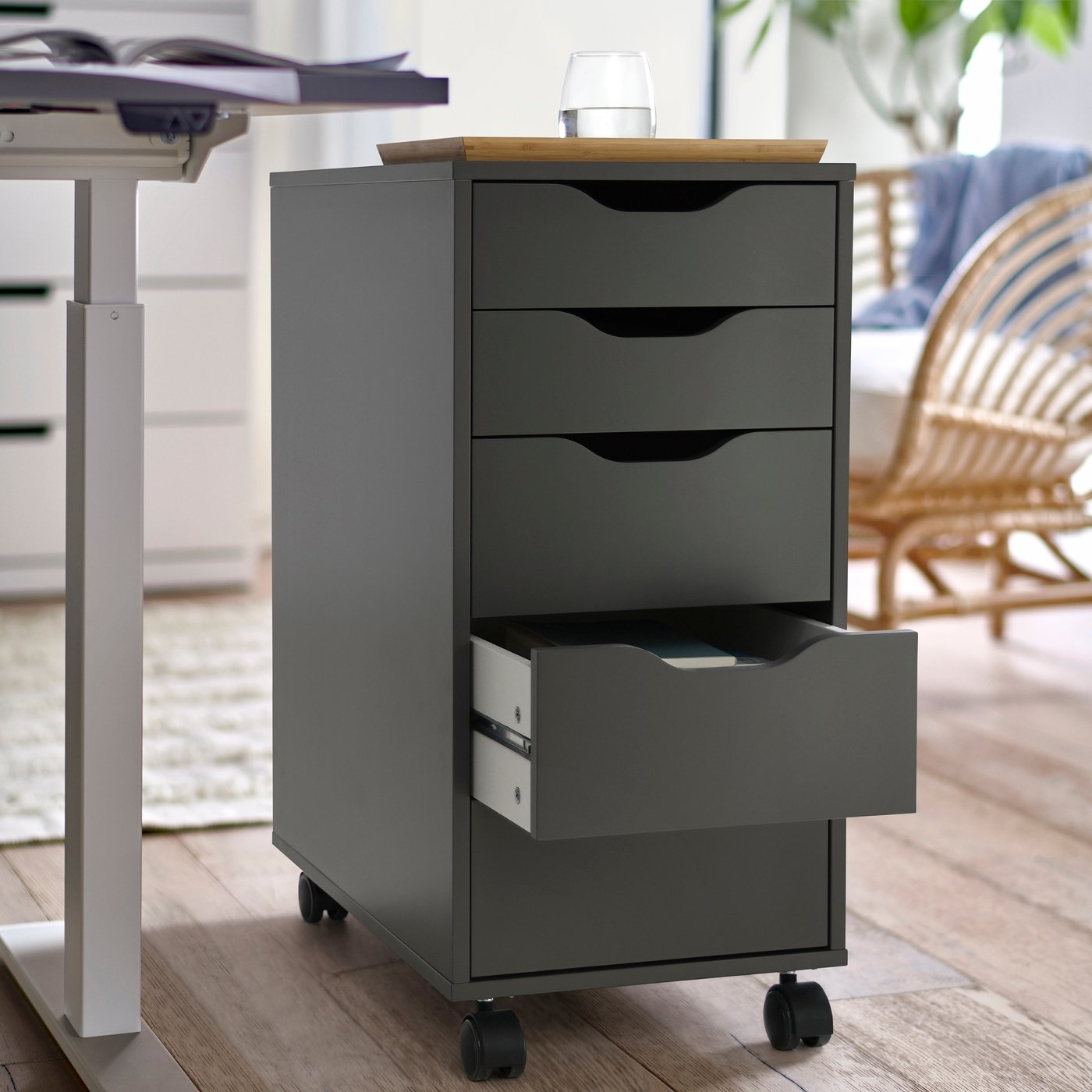 A dark grey/black ALEX drawer unit on castors