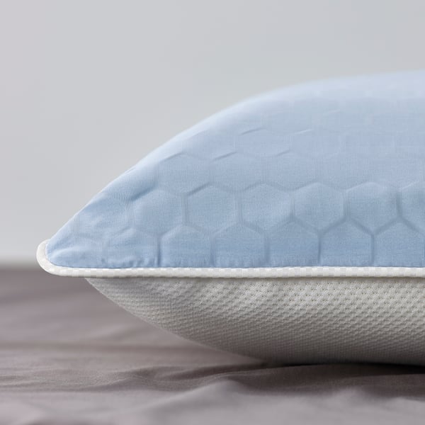 A KVARNVEN ergonomic pillow, side/back sleeper