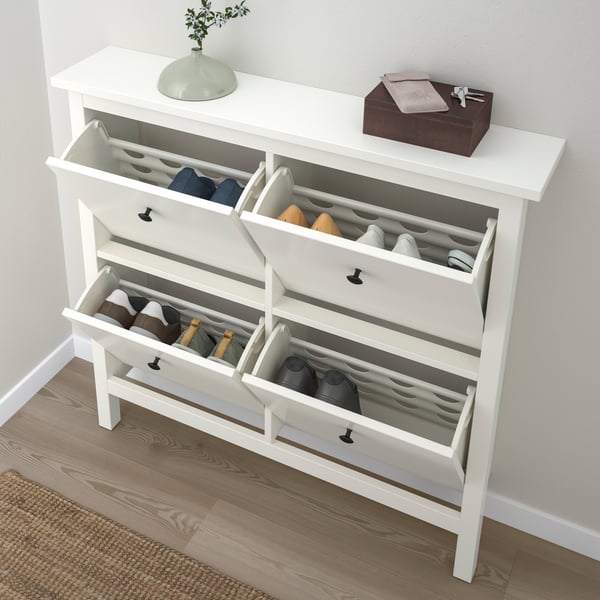 A white HEMNES shoe cabinet with 4 compartments