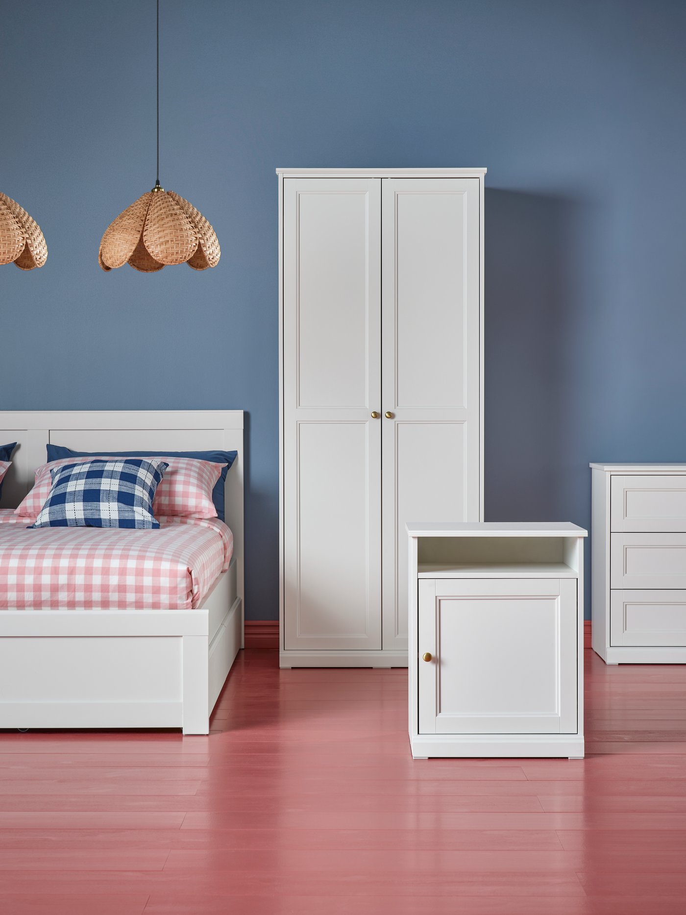 FÅGELFJÄLLET bed frame, bedside table, wardrobe and chest of drawers arranged in a still-life style in a studio setting.