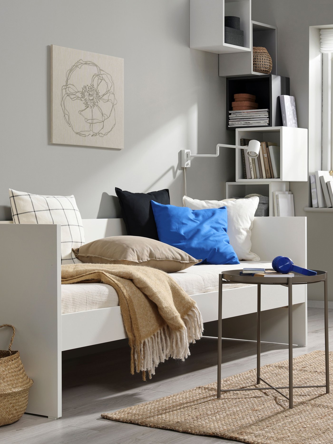 A white VIHALS day-bed frame