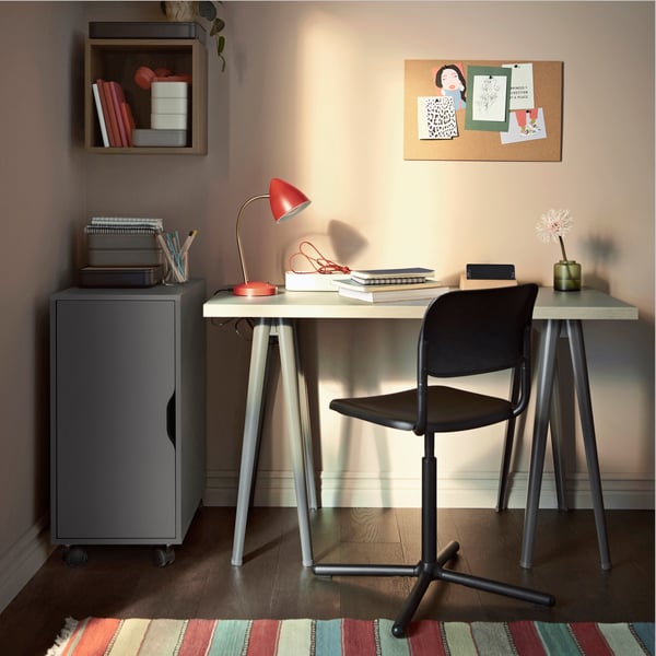 A dark grey/black ALEX storage unit on castors