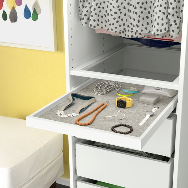 A white/light grey KOMPLEMENT pull-out tray with drawer mat.