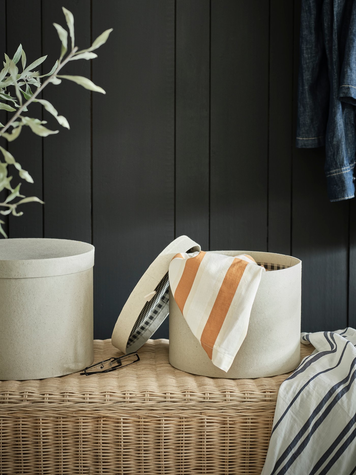A handmade rattan TOLKNING bench with storage