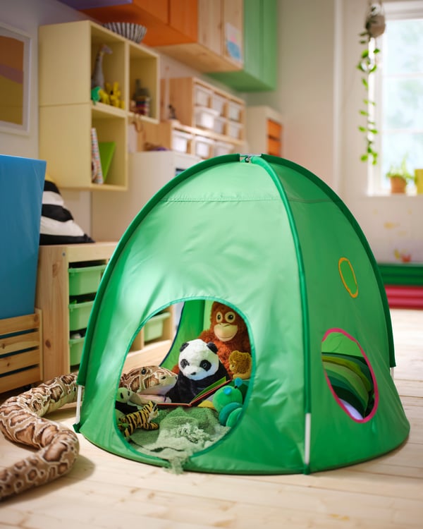 A pine IVAR storage box on wheels in the childrens room