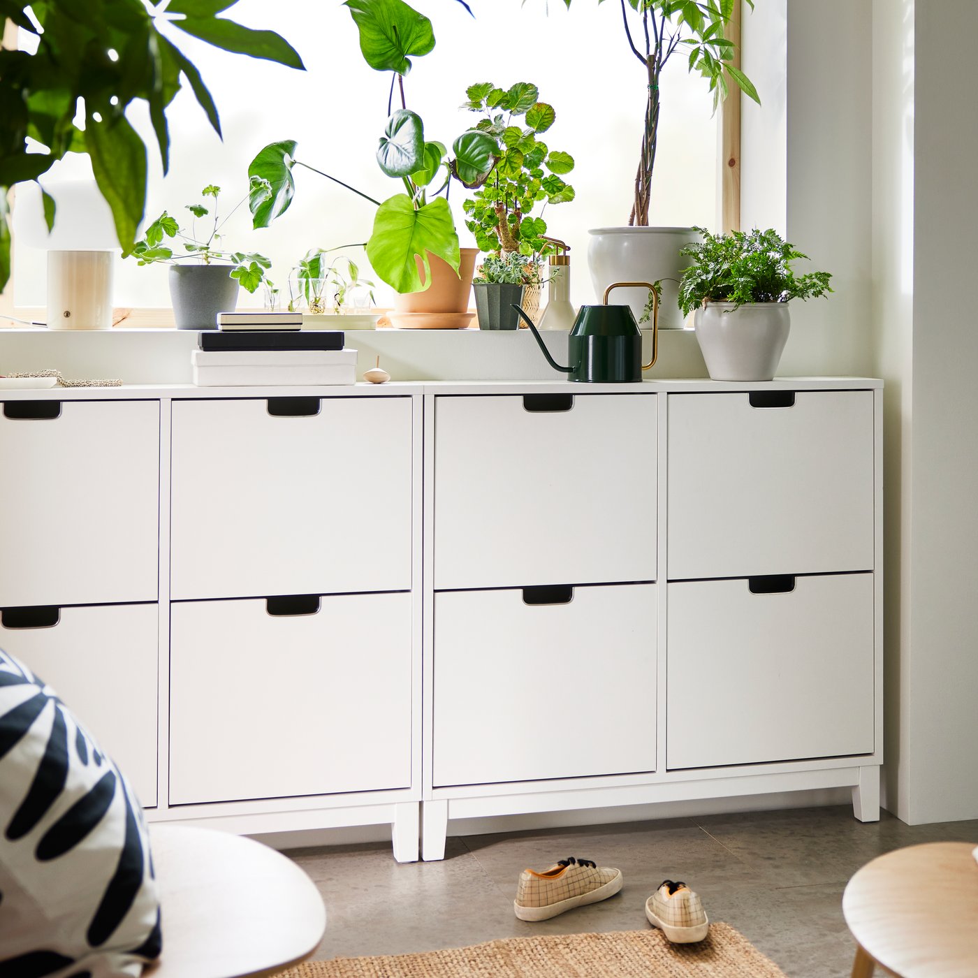 An off-white/dot pattern black ODDNY cushion cover