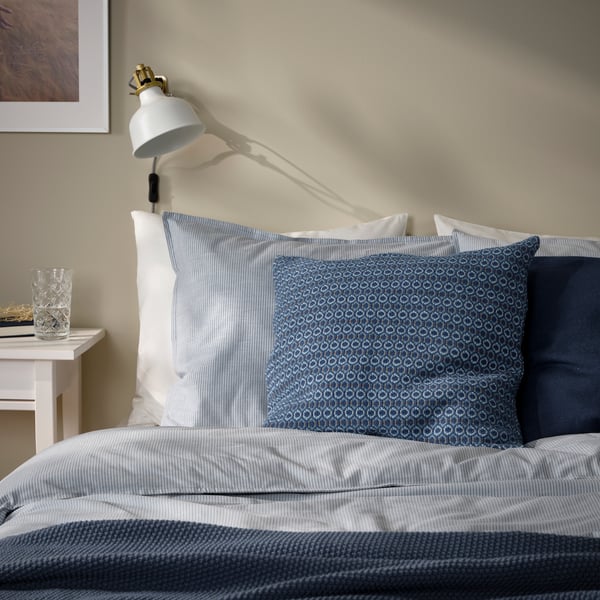 A dark blue/grey-blue MOROTSMOTT cushion cover