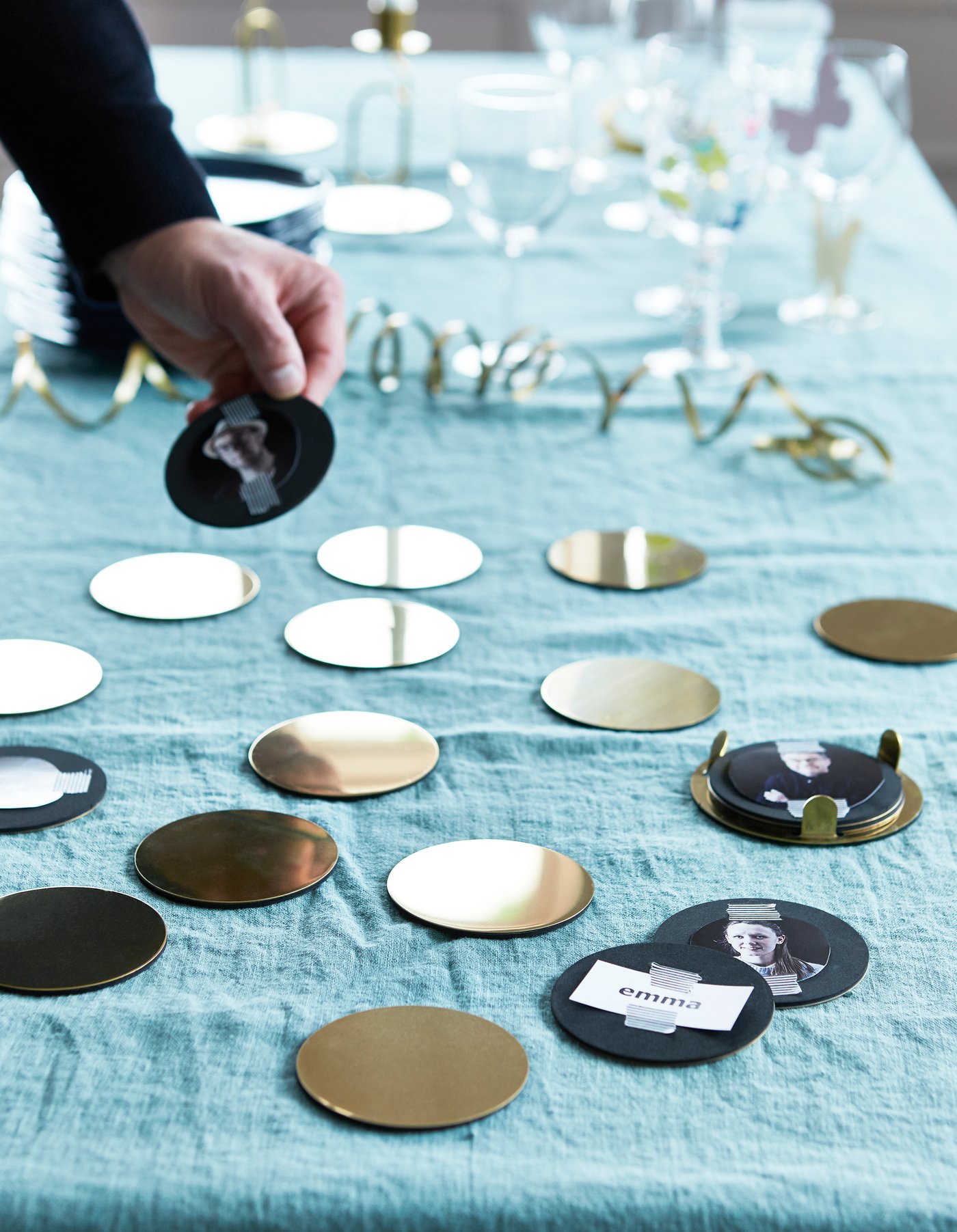 Gold-coloured GLATTIS coasters printed with photos and names, turned into a homemade memory game.