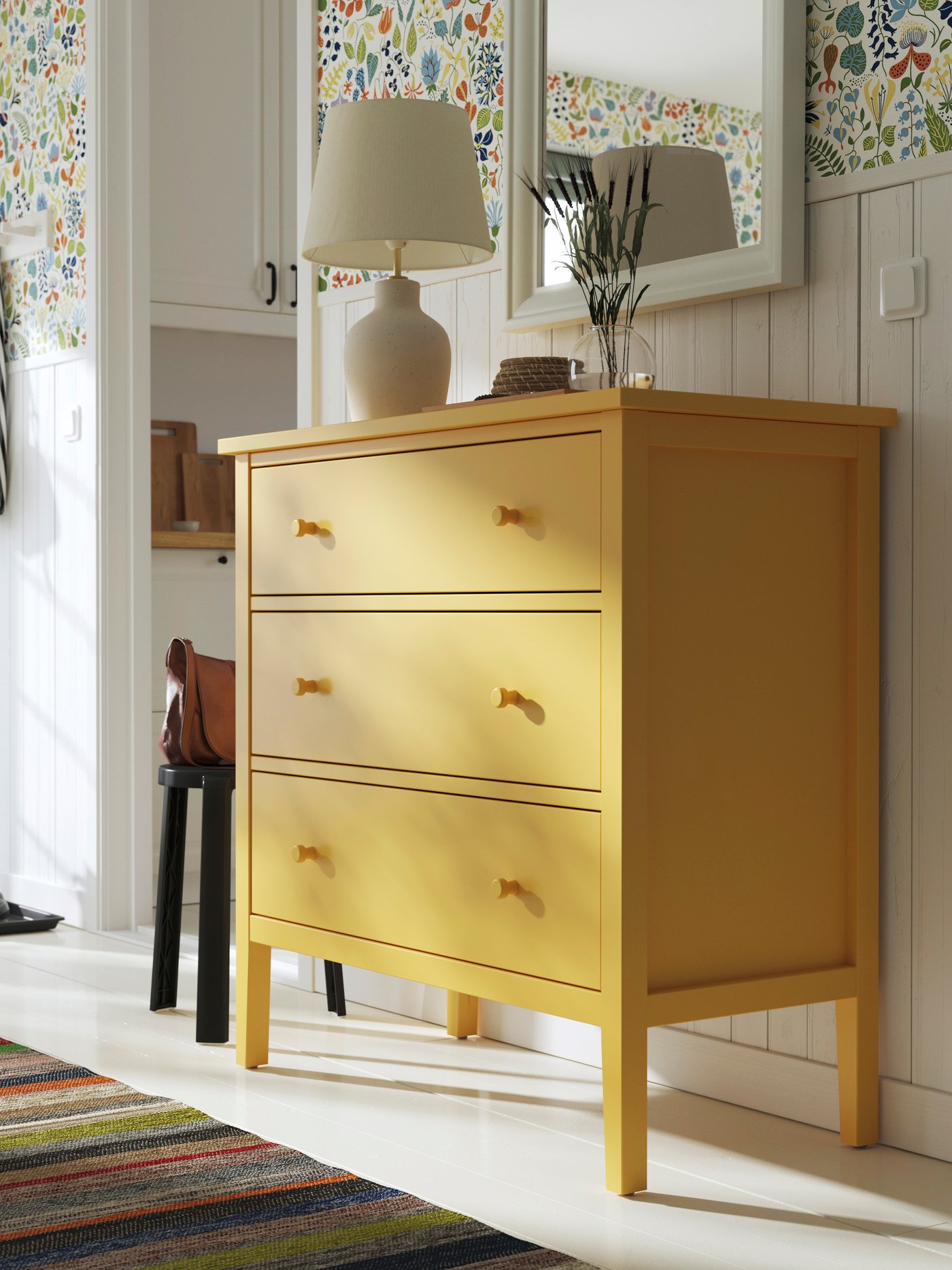 An yellow GULLABERG chest of 3 drawers