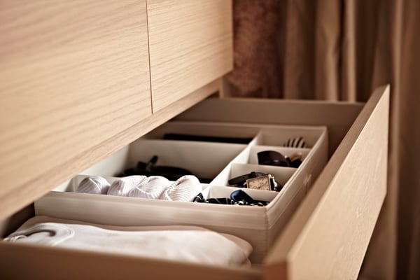White SKUBB box with compartments in an open drawer.