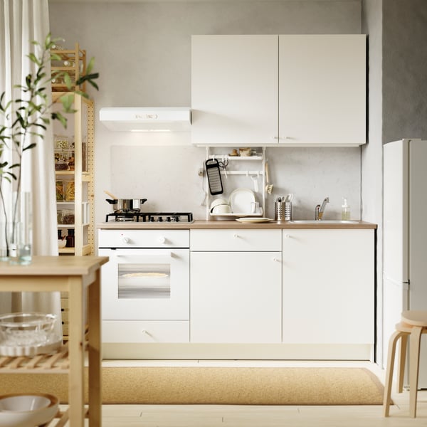 A black IKEA 365+ grater in the kitchen