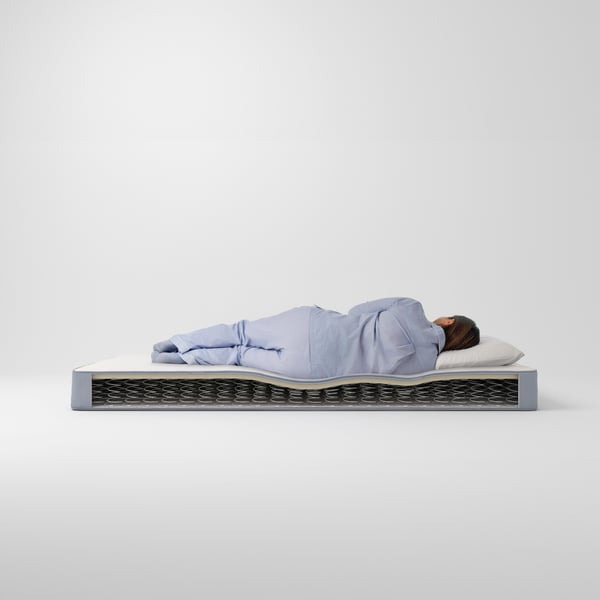 A firm/light blue VESTMARKA sprung mattress