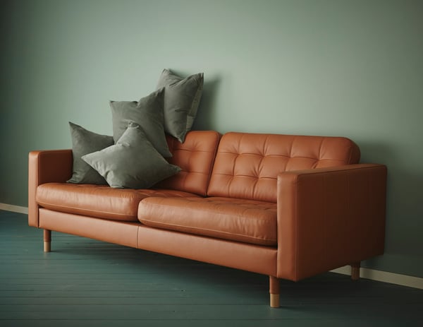 A black-grey VIGDIS cushion cover in the living room
