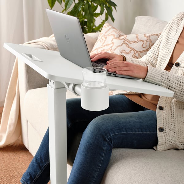 A white MITTZON laptop table with castors