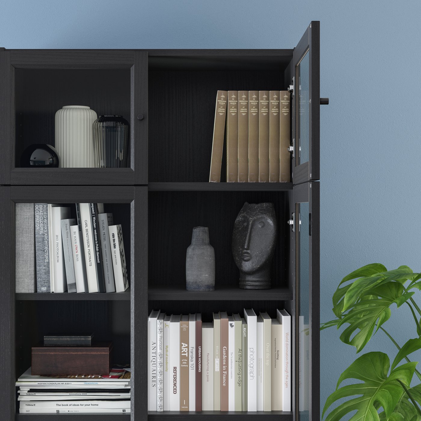 A black-brown BILLY bookcase w hght ext ut/pnl/glss drs