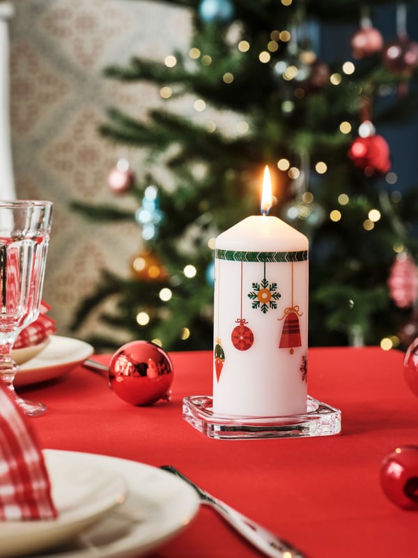 A christmas motifs white VINTERFINT unscented pillar candle