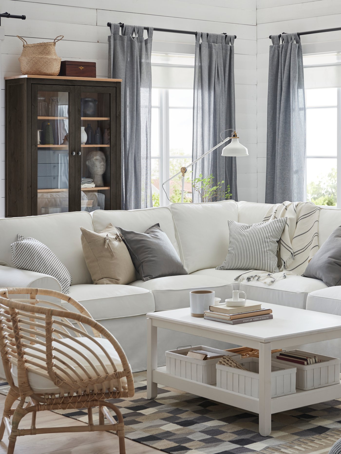 An off-white RANARP floor/reading lamp in the living room