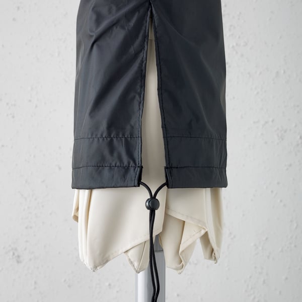 Black TOSTERÖ parasol cover.
