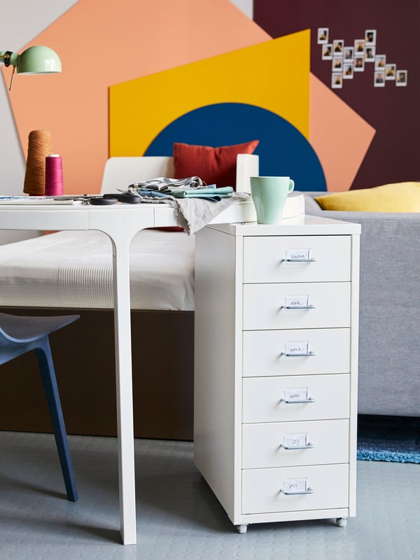 A white HELMER drawer unit on castors