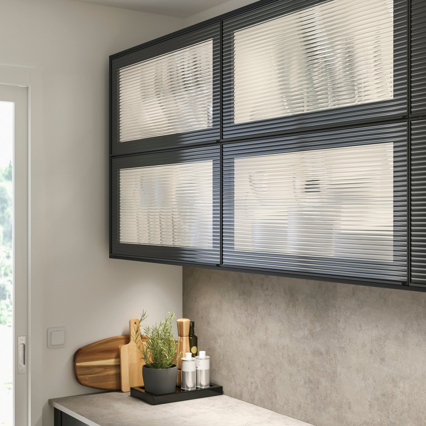 An anthracite/reeded glass HEJSTA glass door