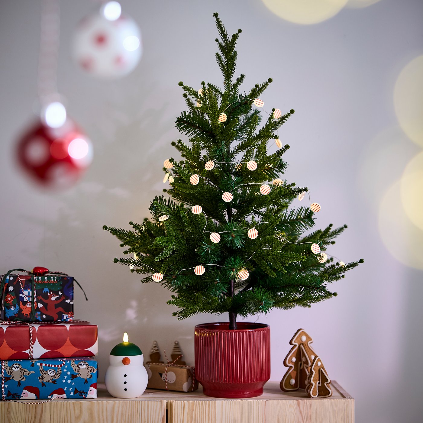 An in/outdoor/Christmas tree green VINTERFINT artificial potted plant.