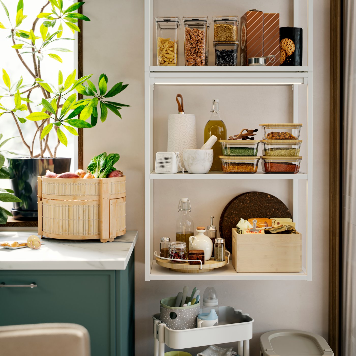 An ENHET wall frame is mounted on a kitchen wall, and there’s a basket made of bamboo on the kitchen countertop next to it.