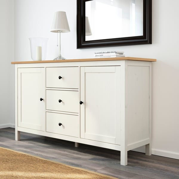A white stain/light brown HEMNES sideboard