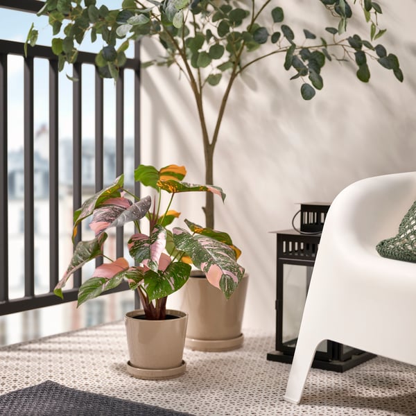 An in/outdoor Philodendron/green/pink FEJKA artificial potted plant
