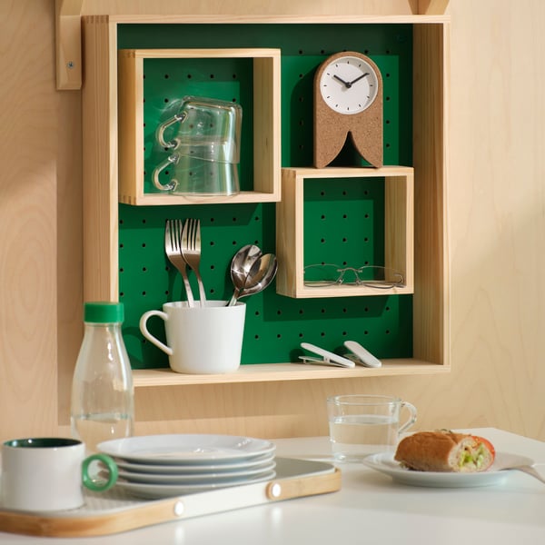 A pine/green SKOGSMOSAIK display shelf