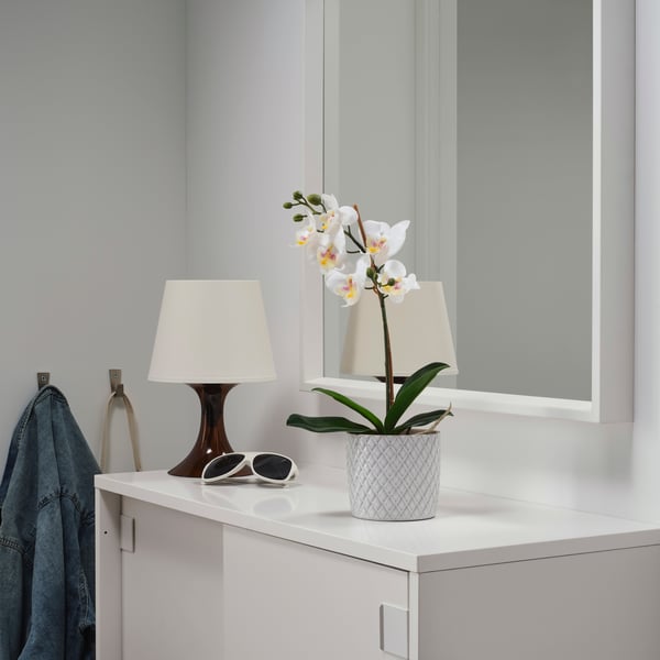 An Orchid white FEJKA artificial potted plant