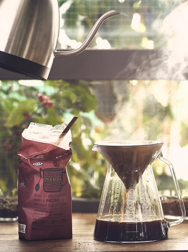 A clear glass/stainless steel HÖGMODIG coffee maker for drip coffee