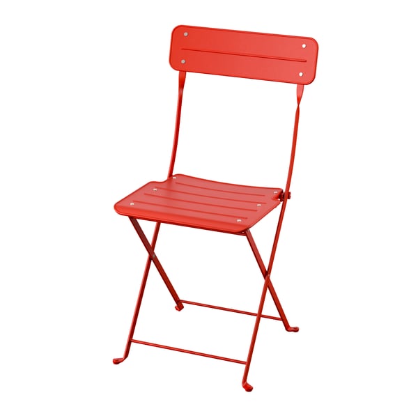A bright red outdoor SUNDSÖ folding chair in the NA