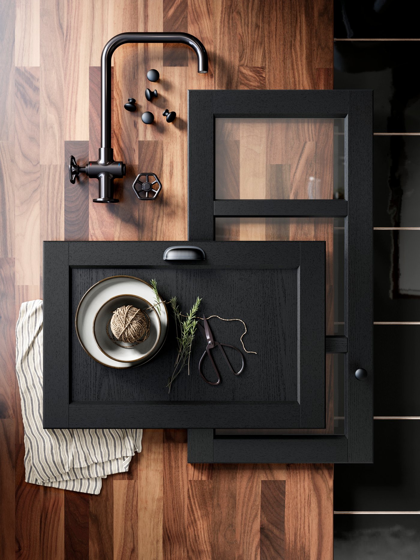 A black stained LERHYTTAN drawer front