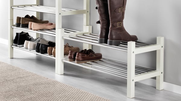 A white TJUSIG shoe rack in the hallway