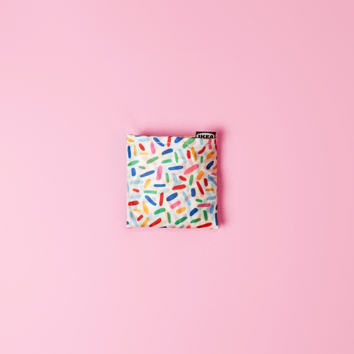 A multicolour/patterned SKYNKE carrier bag