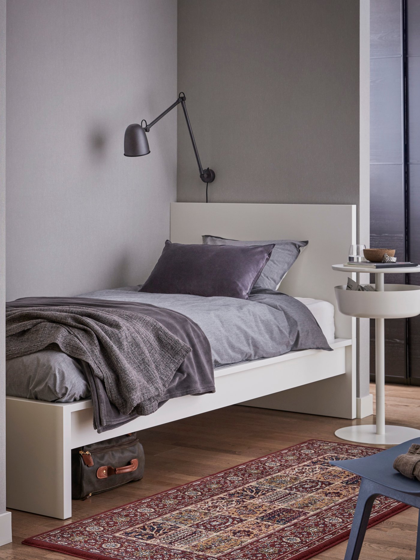 A white MALM bed frame, high