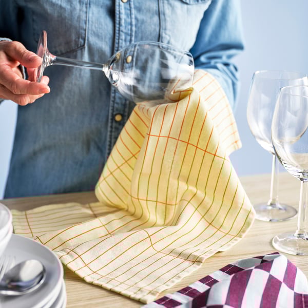 A multicolour/patterned SPJUTLILJA tea towel