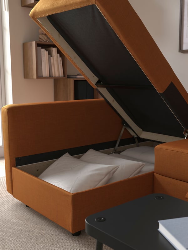 A Faringe brown-orange FRIHETEN backrest for corner sofa-bed