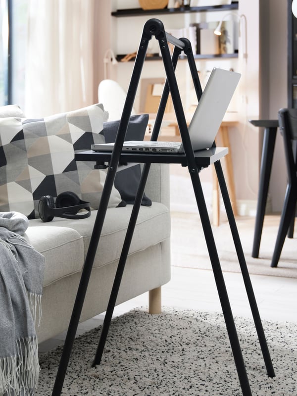 A black BJÖRKÅSEN folding table